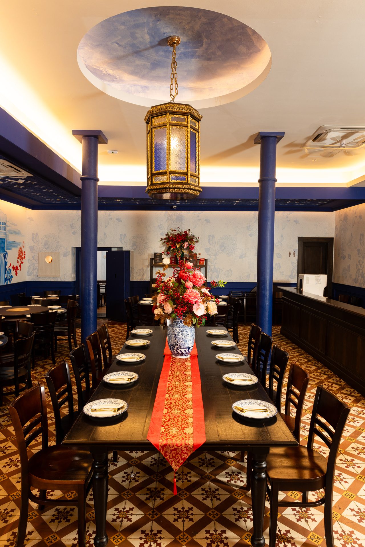 Private dining room at Auntie Gaik Lean's Old School Eatery — seats up to 12 guests around a traditional tong tok table